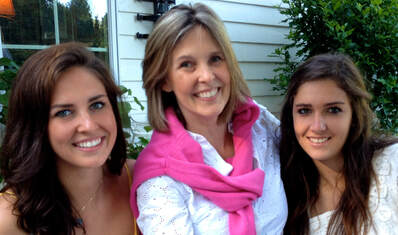 Debbie, center, with her daughters